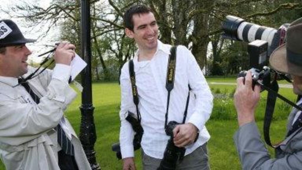 Castlebar-based freelance photographer Keith Heneghan, who won
the photography section in the Western Development Commission John
Healy Awards for Journalism, is set upon by news-hungry journalists
Philip Sweeney and Robert Smith of Arcana, Galway.