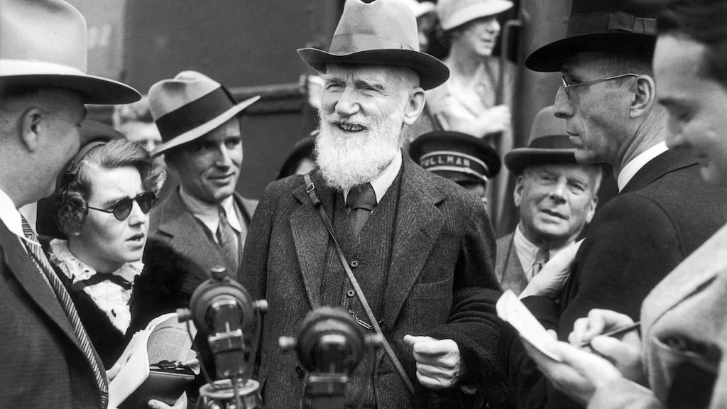 George Bernard Shaw on a visit in Los Angeles answering questions from the American journalists around him. Photograph: Keystone-France/Gamma-Keystone via Getty Images