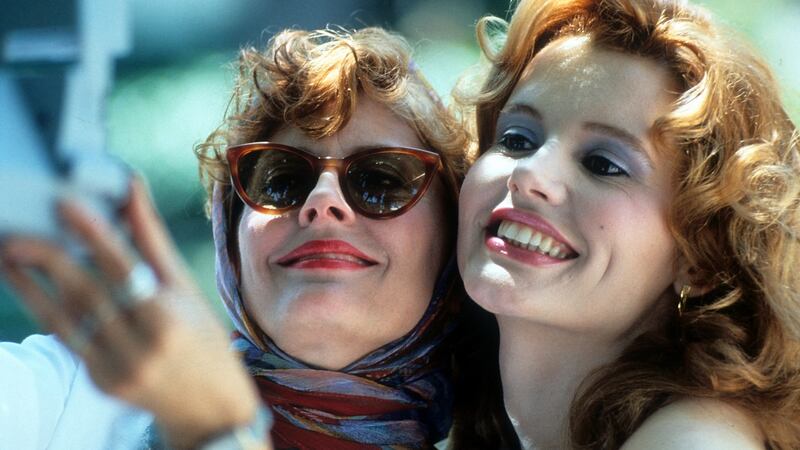 Susan Sarandon and Geena Davis taking a Polaroid of themselves in a scene from the film Thelma & Louise, 1991. Photograph: Metro-Goldwyn-Mayer/Getty Images