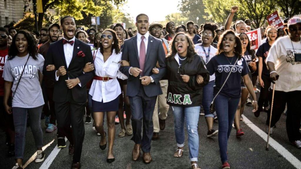 Students of Howard University march from campus to the Lincoln Memorial to participate in the Realise the Dream Rally for the 50th anniversary of the March in Washington . Photograph: James Lawler Duggan /Reuters