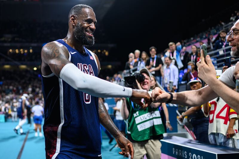 LeBron James greets fans after the USA's group match against Serbia at the Olympic Games in Paris. Photograph: Markus Gilliar/GES Sportfoto/Getty Images