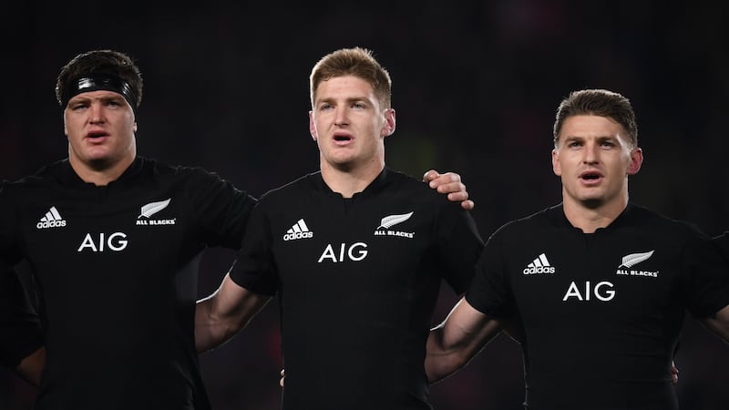 From left, Scott Barrett, Jordie Barrett and Beauden Barrett sing the national anthem ahead of their clash with Samoa last week. Photo: Stephen McCarthy/Sportsfile via Getty Images