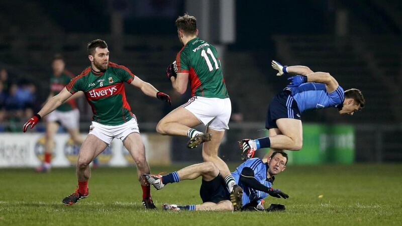 Aidan O’Shea of Mayo tries to find a wa past Denis Bastick and Paul Flynn. Photograph: Donall Farmer/Inpho