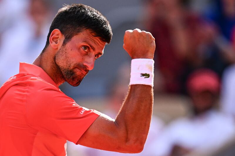 Novak Djokovic celebrates a point against Carlos Alcaraz during their semi-final at the French Open. Photograph: Emmanuel Dunand/AFP via Getty Images