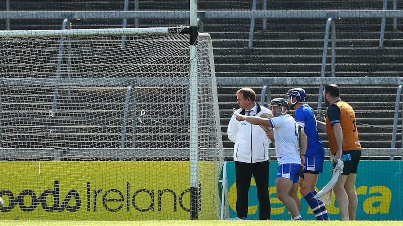 Noel Connors and goalkeeper Stephen O’Keeffe argue with the umpire after the goal was awarded. Photo: James Crombie/Inpho