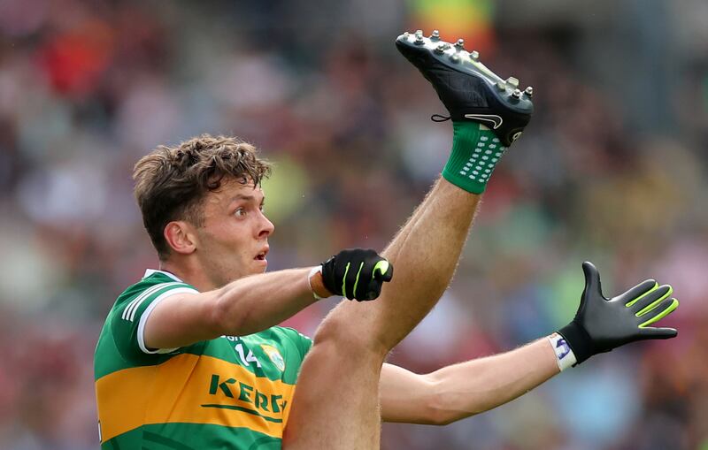 Kerry’s David Clifford kicks a point. Photograph: James Crombie/Inpho