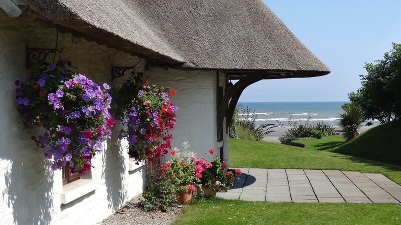 The Cottages at Bettystown, Co Meath, is a collection of six quaint thatched cottages with vaulted oak-beam ceilings and open fireplaces
