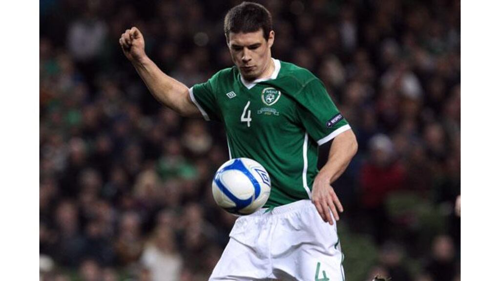 Darren O'Dea in action for the Republic of Ireland in March. O'Dea faces an uncertain future at Celtic as he needs first team action to safeguard his international career. Photograph: Cathal Noonan/Inpho