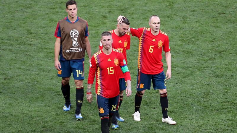 Azpilicueta, Ramos, Alba and Iniesta leave the pitch afterwards. Photo: Abedin Taherkenareh/EPA