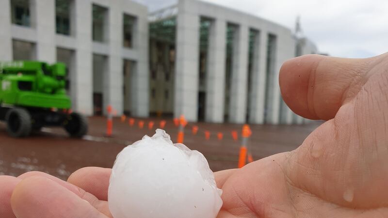 A handout photo courtesy of Don Arthur shows a hail stone outside the Parliament House in Canberra. Photograph: Getty