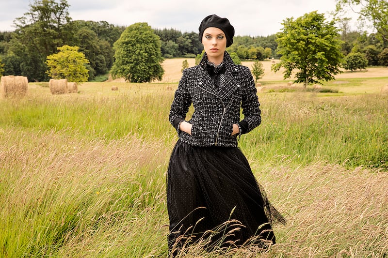 Louise Kennedy: Rylee black and white tweed biker jacket €995, Celia black polka-dot tulle skirt €595, Julia printed silk georgette blouse €795, Cassandra corsage €195