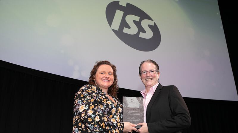 Dr Alison Connolly, Awards Judge, presents the Health & Safety Excellence Award - Facilities Management award to Lisa Hughes, ISS Facility Services Ireland.