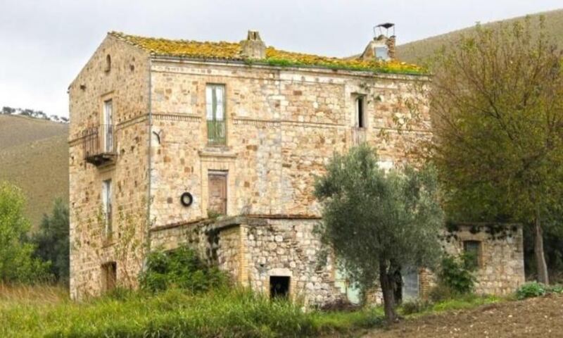 Set in the hills close to Chieti city, this three-storey stone property comprises two attached houses on about 1.5ac of land