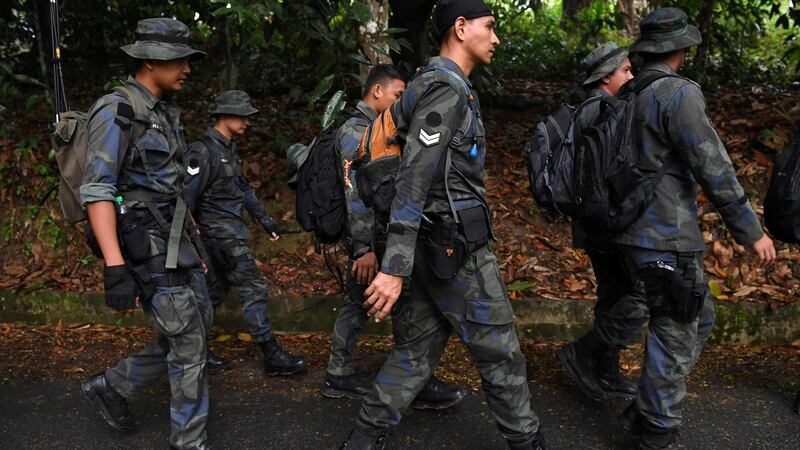 Members of a rescue team take part in search efforts in Seremban on August 10th, 2019. Photograph: Mohd Rasfan/AFP/Getty Images