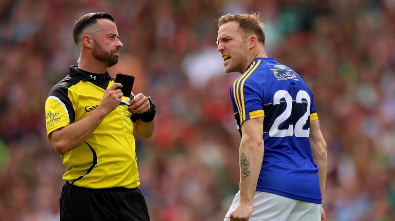 Darran O’Sullivan argues with referee David Gough after being black carded. Photograph: James Crombie/Inpho