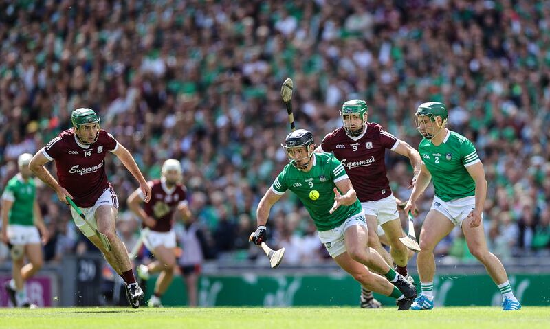 Galway’s Brian Concannon and David Burke with Darragh O'Donovan and Seán Finn of Limerick. Photograph: James Crombie/Inpho