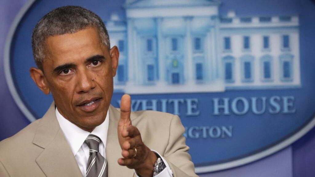 US president Barack Obama discusses possible action against ISIS in a White House press briefing. Photograph: Alex Wong/Getty Images