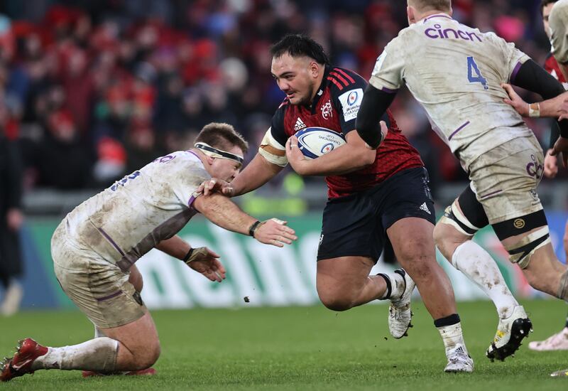 Munster’s Roman Salanoa takes on Northampton's Paul Hill during the recent Champions Cup clash at Thomond Park. Photograph: Billy Stickland/Inpho