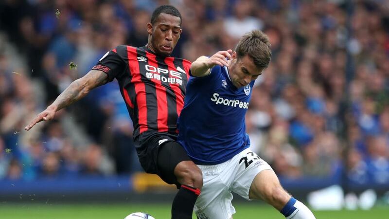 Seamus Coleman tussles with Rajiv van La Parra during Everton’s draw with Huddersfield. Photograph: Ian MacNicol/Getty