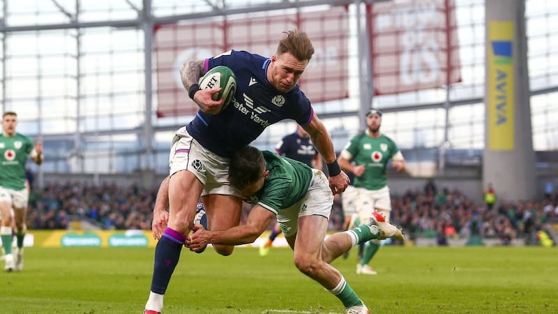 Hugo Keenan had one of the moments of the game with a try-saving tackle on Stuart Hogg. Photograph: Ken Sutton/Inpho