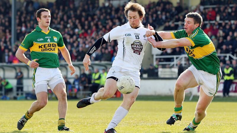 Kildare’s Seanie Johnston scores a goal  while under pressure from Shane Enright and Tomás Ó Sé of Kerry during the Allianz Football League Division 1 game in March 2013. Kerry went on to survive in the top flight despite losing their opening four games. Photograph:   Cathal Noonan/Inpho