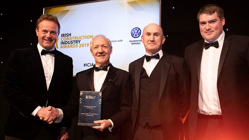 Alan Crawford, Awards Judge presents the Construction Product of the Year award to the Versatile Group team.