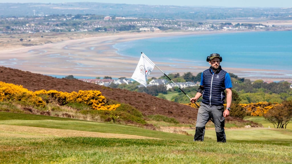 Gerard Morgan, golf course superintendent, preparing the course at Howth Golf Club for the return to play on Monday. Photo: Paul Faith/AFP via Getty Images