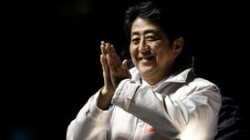 Japan election: Shinzo Abe’s party wins with fewer seats