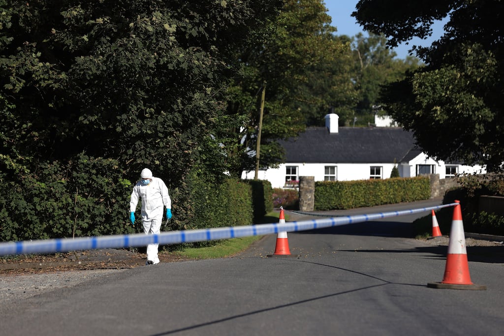 A police forensic officer at the scene of the shooting in the Ballsmill Road area of Crossmaglen. Photograph: Liam McBurney/PA Wire