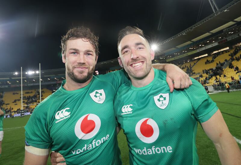 Jack Conan celebrates Ireland's win over New Zealand in the third Test in Wellington with Caelan Doris. Photograph: Billy Stickland/Inpho
