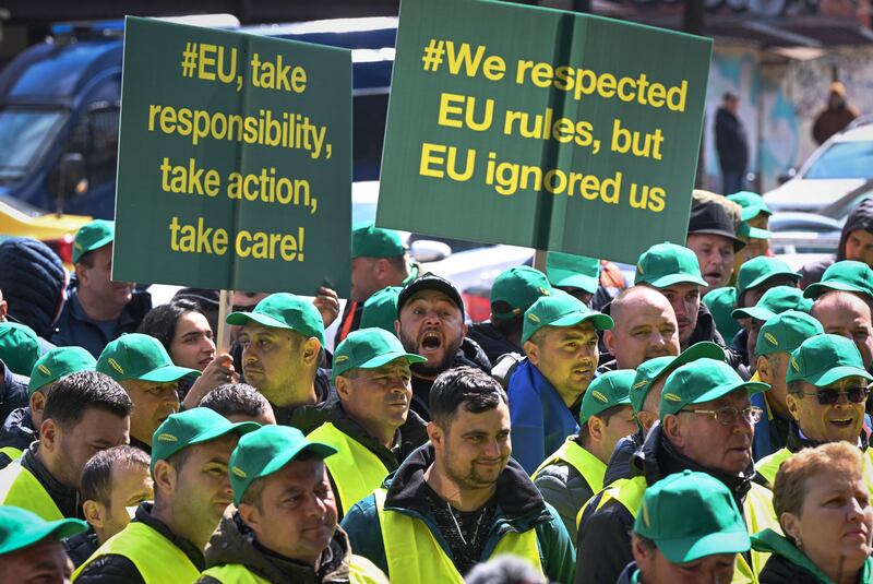 Romanian farmers protest at the European Commission HQ in Bucharest, Romania, on April 7th, 2023, against what they called insufficient compensation from the EU over elimination of customs duties on goods from Ukraine. Photograph: Daniel Mihailescu/AFP/Getty
