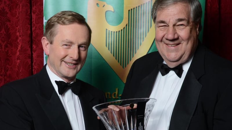 Dennis Swanson with then taoiseach Enda Kenny in 2014