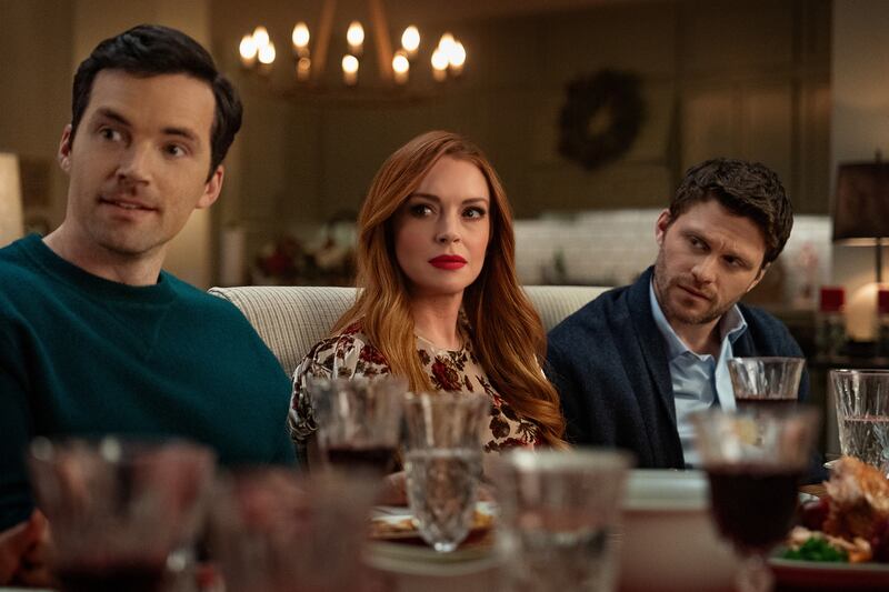 Ian Harding, Lindsay Lohan and Jon Rudnitsky in Our Little Secret. Photograph: Bob Mahoney/Netflix
