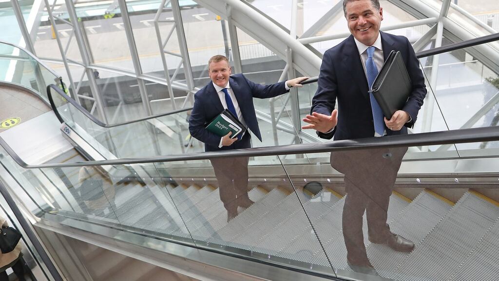 Minister for Public Expenditure and Reform Michael McGrath and Minister for Finance Paschal Donohoe arrive at  the Convention Centre in Dublin to announce Budget 2021. Photograph: Julien Behal Photography/PA Wire