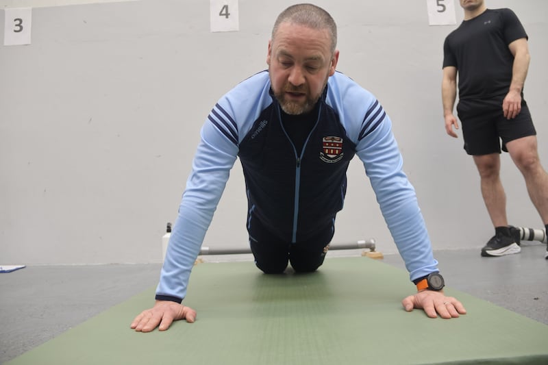 Sgt Pat Kirwan of the Garda College in Templemore demonstrating the right push-up technique. Photograph: Ronan McGreevy