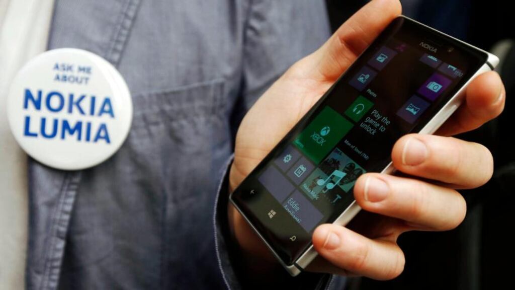 Nokia is aiming the 925 smartphone at a more premium audience as it aims to edge its shipment figures higher. Photograph: Reuters/Luke MacGregor