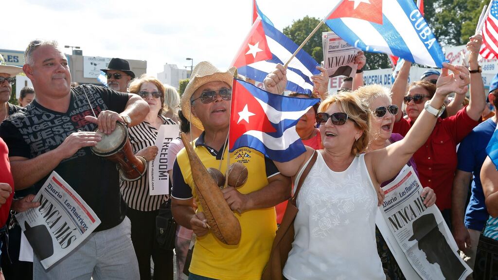 Cuban Americans celebrate the death of Fidel Castro in the Little Havana neighbourhood of Miami, Florida on Sunday. Photograph: Rhona Wise/AFP/Getty Images