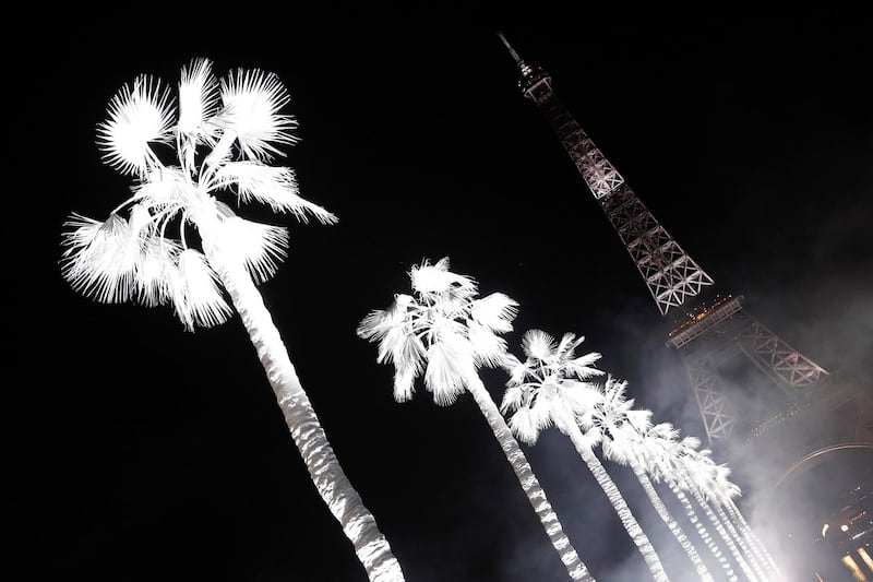 Paris Fashion Week: the Saint Laurent show was set beneath the lights of the Eiffel Tower. Photograph: François Guillot/AFP/Getty