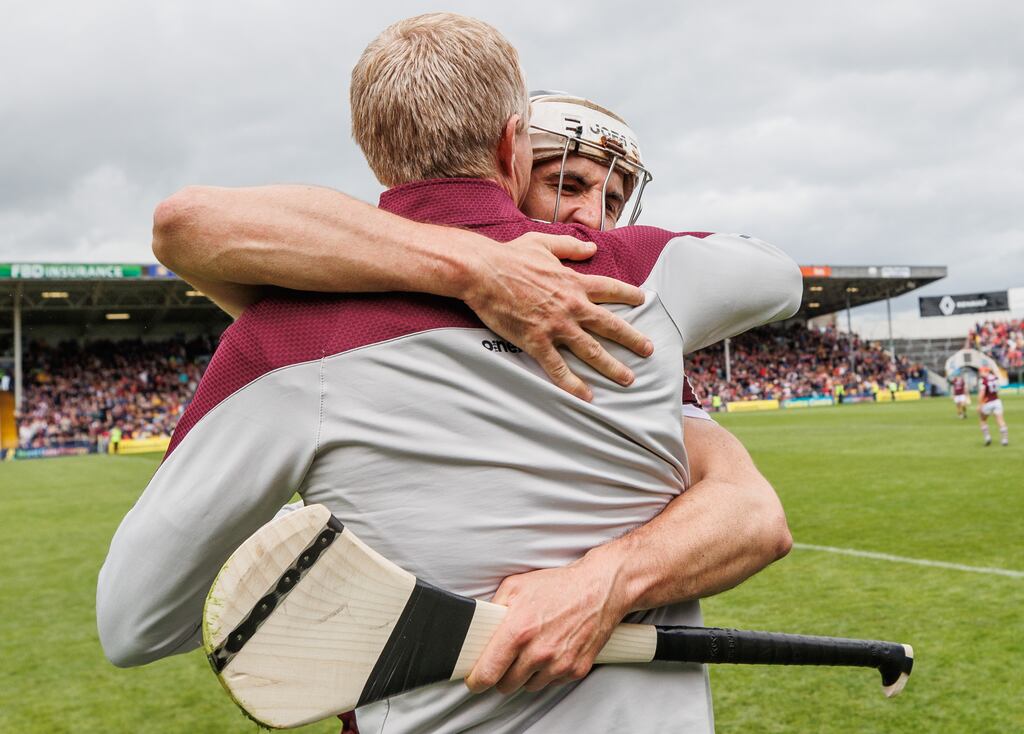 Daithí Burke and Galway manager Henry Shefflin celebrate after the victory over Cork in the All-Ireland quarter-final at FBD Semple Stadium in Thurles. Photograph: James Crombie/Inpho