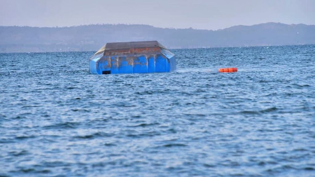 The upturned passenger ferry MV Nyerere in the water near Ukara Island in Lake Victoria, Tanzania on Friday. Photograph: AP