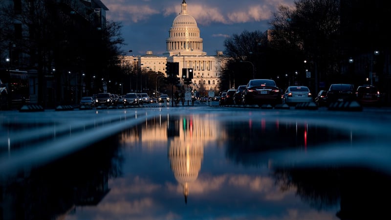 The sun sets on the US Capitol on Friday. US members of Congress are unlikely to be satisfied is all they receive is the bare bones of special counsel Robert Mueller’s report on Russian interference in the 2016 US presidential election. Photograph: Brendan Smialowski/AFP/Getty Images.