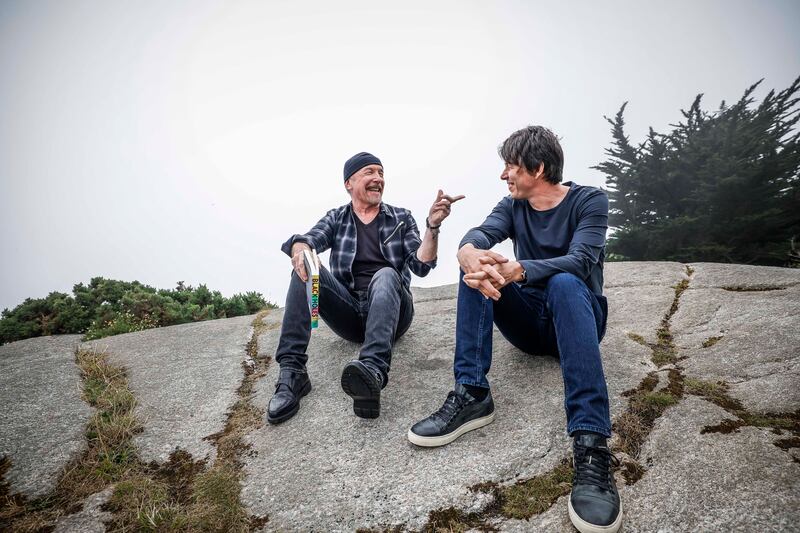 U2 band member The Edge and author of Black Holes: The Key to Understanding the Universe, Prof Brian Cox at last year's Dalkey Book Festival. Photograph: Conor McCabe Photography.