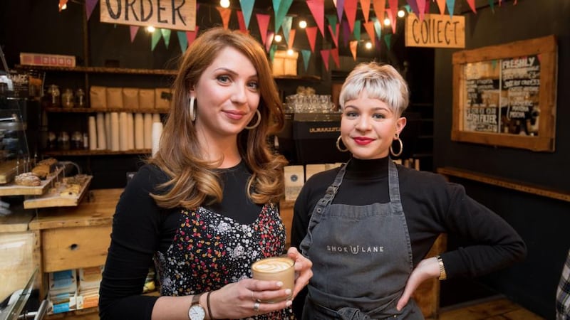Jane Lunnon with one of Shoe Lane’s staff, Juliana Sloane from Brazil: ‘We don’t hire baristas. We hire people with an interest in coffee and personalities and train them.’ Photograph: Tom Honan