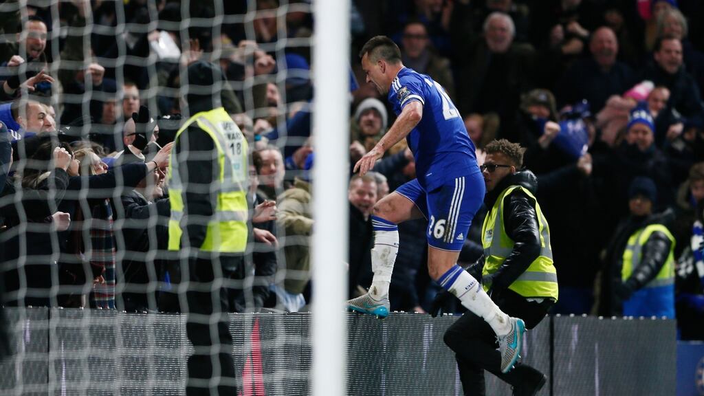 John Terry scored in the 98th minute to salvahe Chelsea a point against Everton. Photograph: Reuters