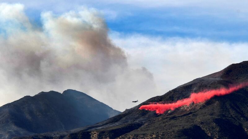 An aircraft drops water on wildfires in Fillmore, California, US, December 8th, 2017. Photograph: Gene Blevins/ Reuters