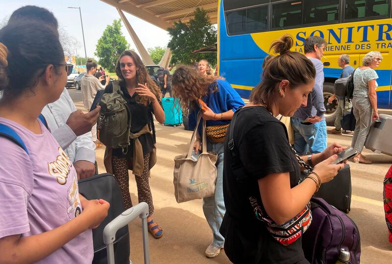 French nationals gather as they wait to be airlifted back to France. Photograph: Sam Mednick/AP/PA