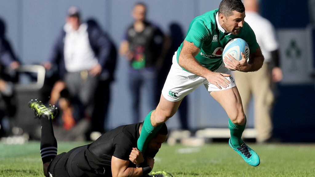Ireland’s Rob Kearney is tackled by Aaron Smith of New Zealand in Soldier Field: “Not only was his performance sublime, his leadership was phenomenal.” Photograph: Dan Sheridan/Inpho