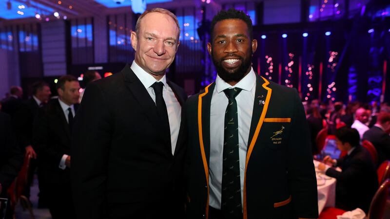 The 1995-winning South African captain Francois Pienaar congratulates current captain Siya Kolisi during the World Rugby Awards at the Prince Park Tower Hotel in Tokyo, Japan. Photograph: Dan Mullan World Rugby/World Rugby via Getty Images