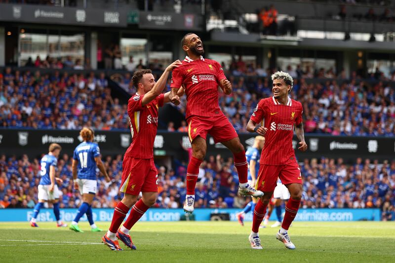 Mohamed Salah of Liverpool celebrates scoring with team-mates Diogo Jota and Luis Díaz during the Premier League match against Ipswich Town at Portman Road, Ipswich, on August 17th, 2024. Photograph: Marc Atkins/Getty Images