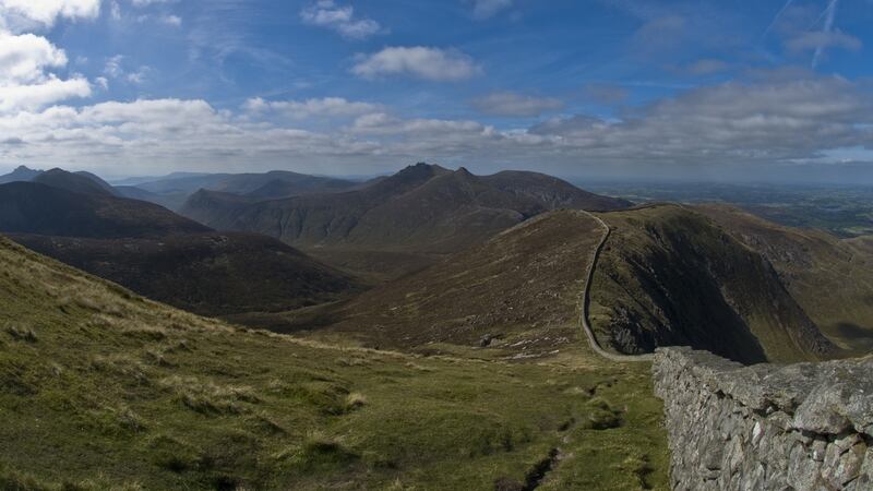 The Mourne Wall reflects the Great Wall of China by undulating 35km over the high Mournes. Photograph: Getty